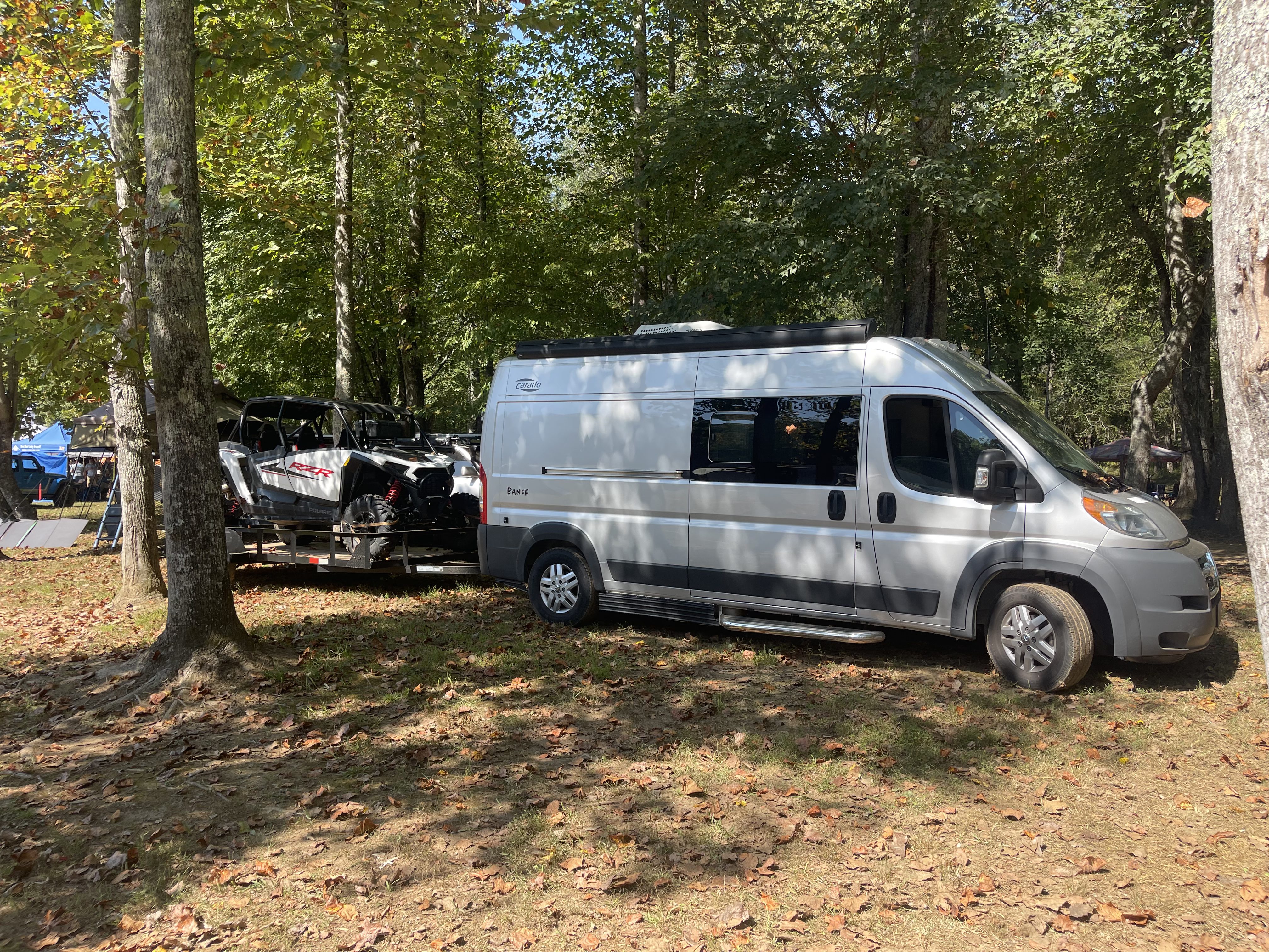 AVR van and UTV at campsite